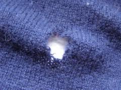 Damaged Sweater From Clothes Moth Larvae
